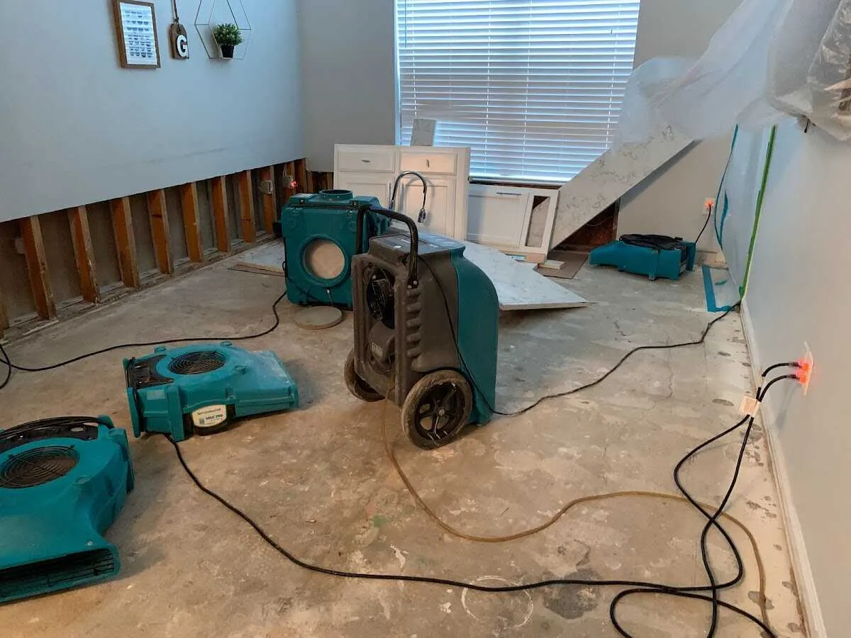 Dehumidifier in flood-cut room for Water Damage Restoration in West Greenwich